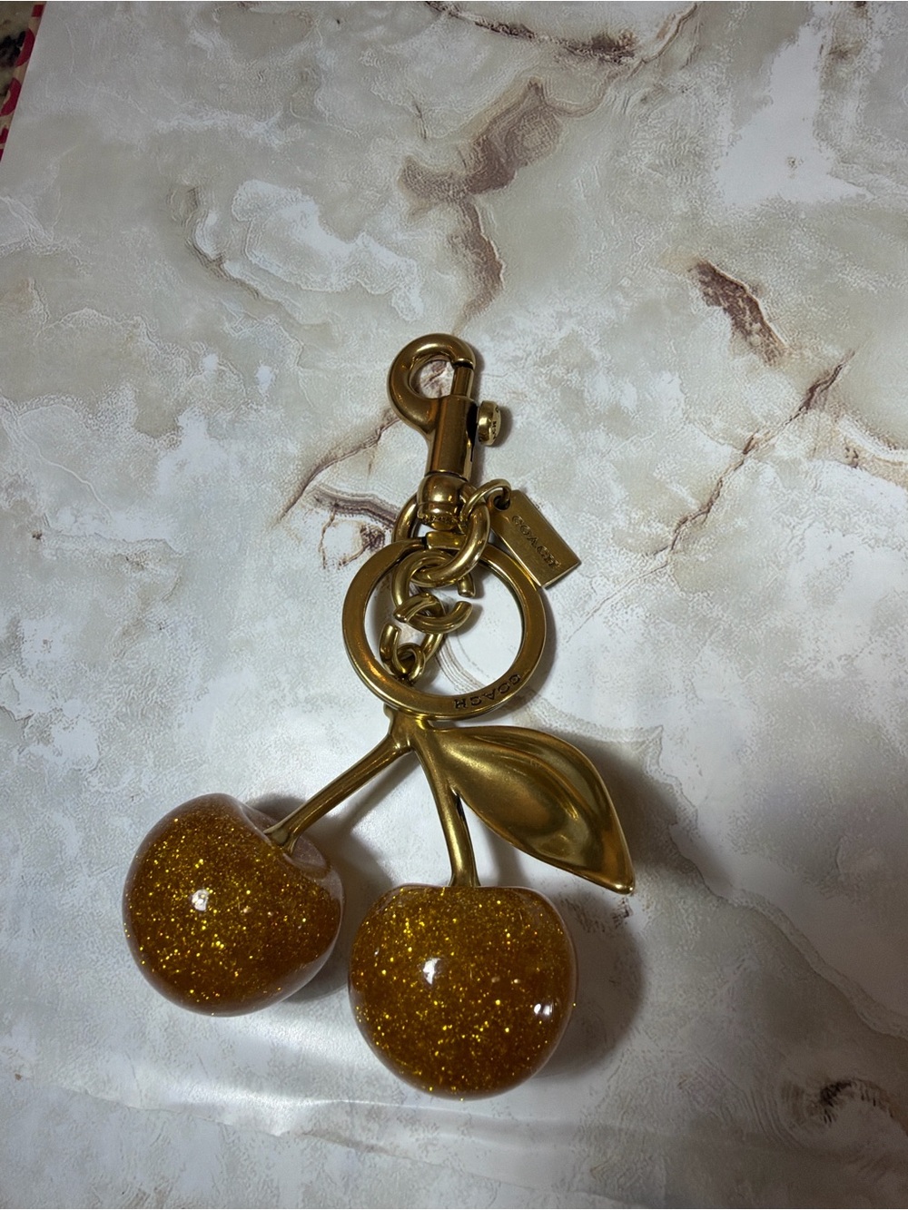 Coach Gold Glitter Cherry Bag Charm Keychain - Picture 3 of 3